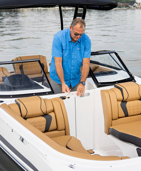 Bi-fold doors on a Hurricane SunDeck 2600 Outboard boat. 