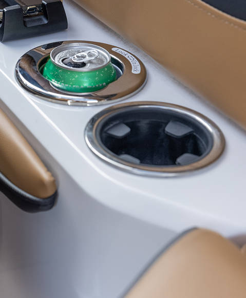 Upgraded heated and cooled cupholders on a Hurricane SunDeck 2600 Outboard boat. 