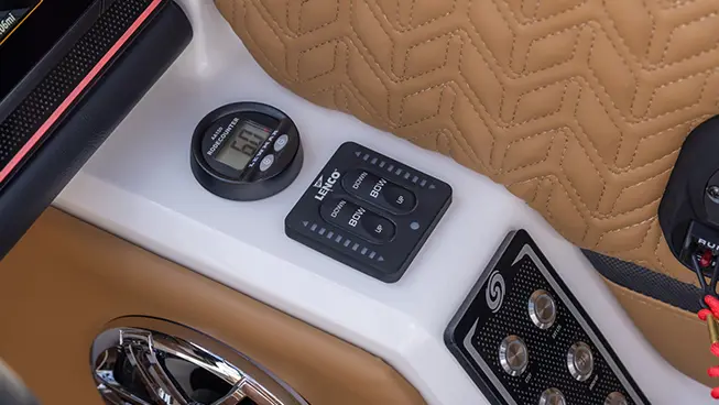 Driver controls on a Hurricane SunDeck 2600 Outboard boat.