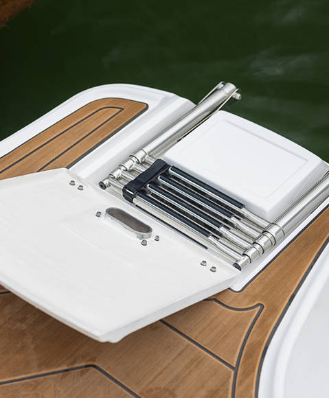 Dual telescoping ladders on a Hurricane SunDeck 2690 Outboard boat. 