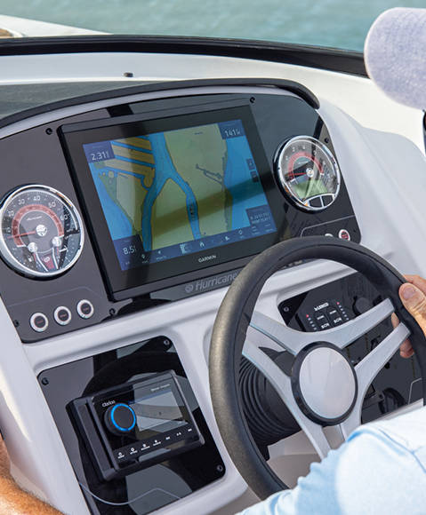 Wireless photo charging feature on a Hurricane SunDeck 2690 Outboard boat. 
