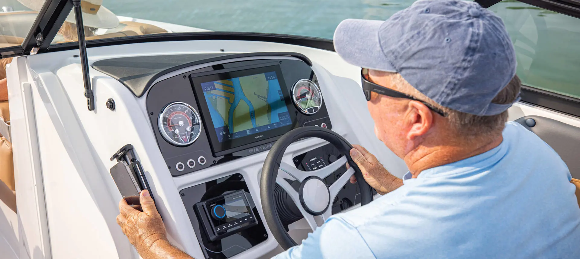 Digtal helm display on a Hurricane SunDeck 2690 Outboard boat.