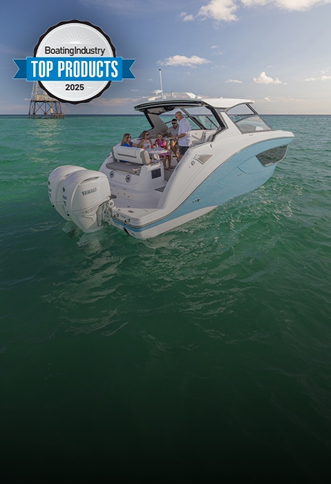 Family enjoying snacks on a parked Hurricane 3200 Outboard boat.