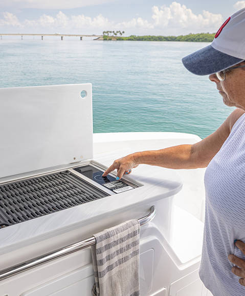 Grill station on a Hurricane 3200 Outboard boat.
