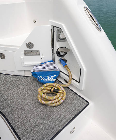Integrated washdown system on a Hurricane 3200 Outboard boat.