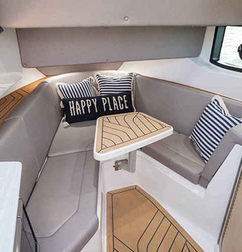 Under cabin seating on a Hurricane 3200 Outboard boat.