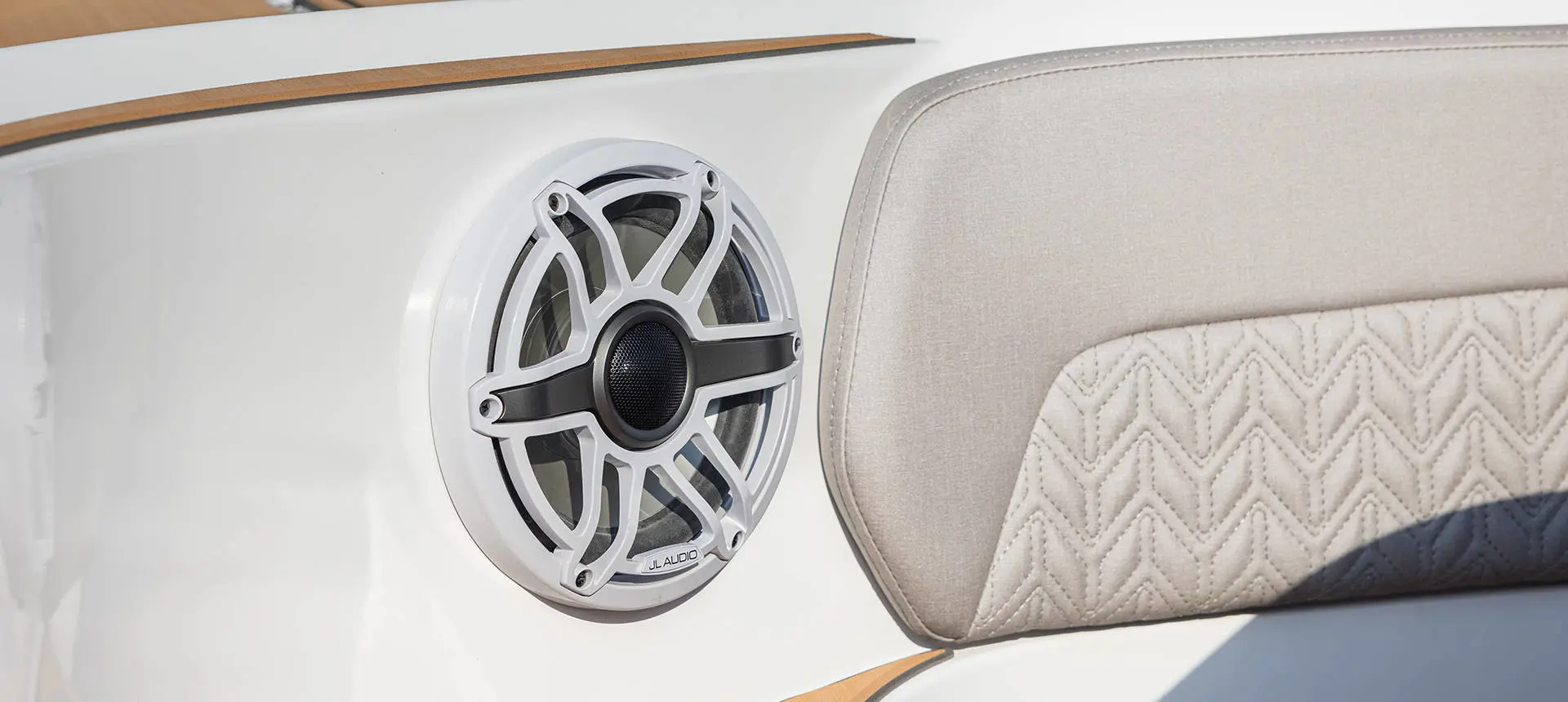 Close-up detail of JL audio speaker on a Hurricane 3200 Outboard boat.