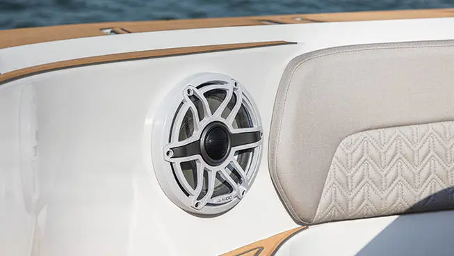 Close-up detail of JL audio speaker on a Hurricane 3200 Outboard boat.