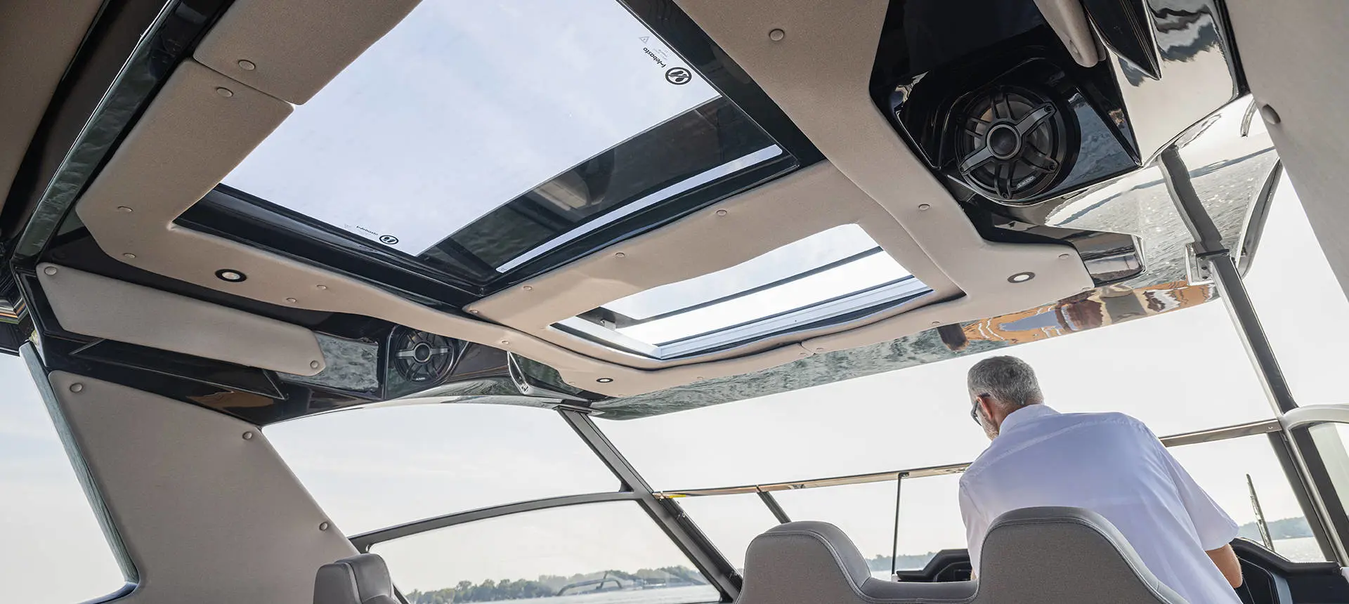 Overhead roof on a Hurricane 3200 Outboard boat.