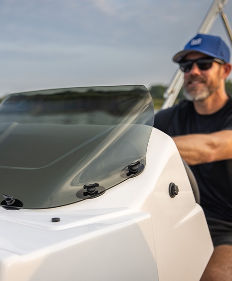 Glass windscreen on a Hurricane SunDeck Sport boat.