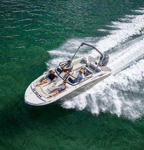 Overhead view of front seating and full wrap-around windshield on a  Hurricane Sundeck boat.