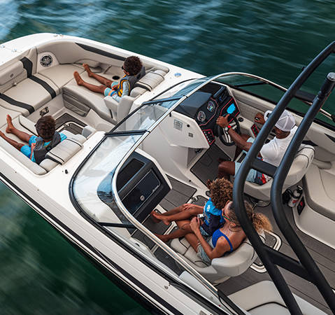 Overhead view of family of 5 cruising on a NNMA certified Hurricane boat. 