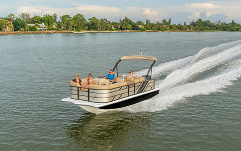 A family cruising through a lake in their Hurricane