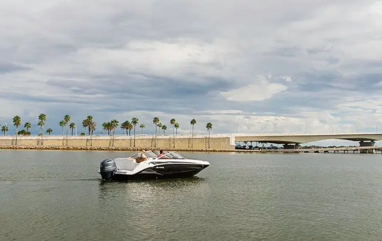 Hurricane boat cruising on a lake