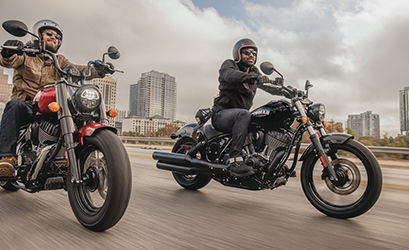 seasoned riders ride in group on indian chief cruiser motorcycles