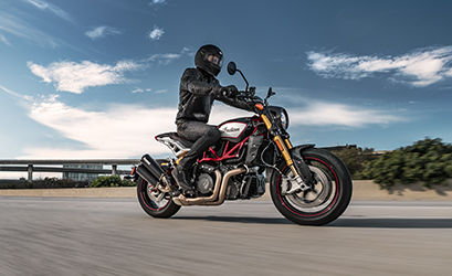 rider cruising on a stylish indian ftr motorcycle