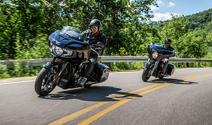 2 bikers highway riding on indian motorcycles