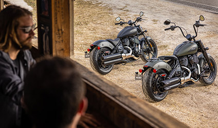 2 parked indian chief bobber dark horse motorcycles