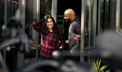 woman and man wearing authentic Indian motorcycle clothing