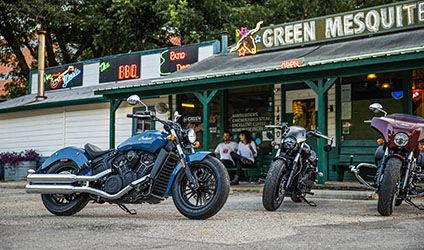 indian motorcycles parked outside a restaurant