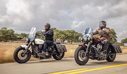 2 bikers having a great ride on their indian super chief motorcycles