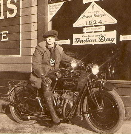 A rider on a vintage Indian motorcycle from 1924.