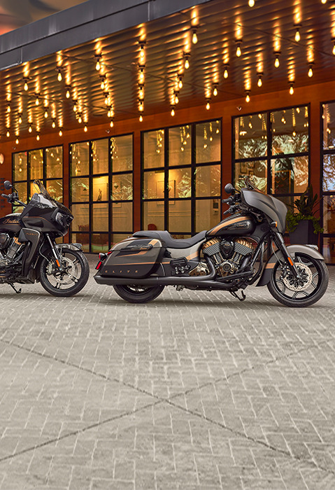 side profile of a 2023 indian purusit elite and a 2023 indian chieftain elite motorcycle