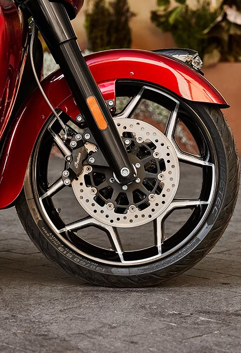 Closeup of the front wheel on a 2024 Indian Roadmaster Elite motorcycle