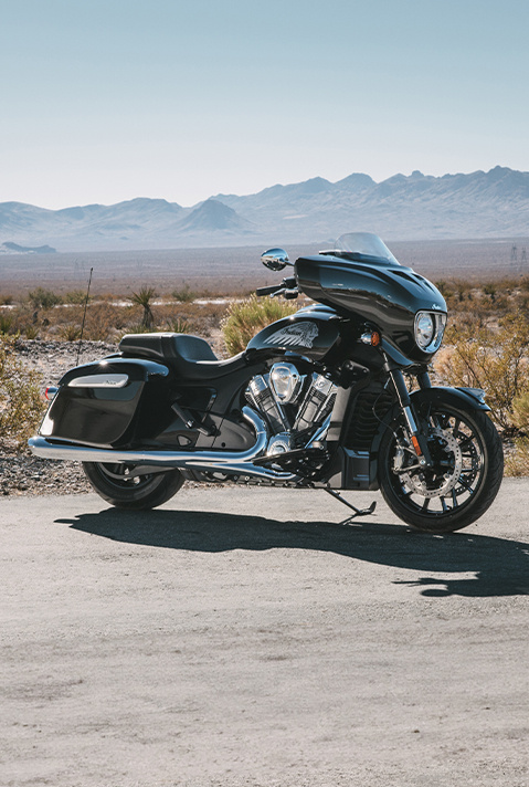 Side profile of a parked 2025 Indian Chieftain PowerPlus motorcycle in the Black Metallic colorway.