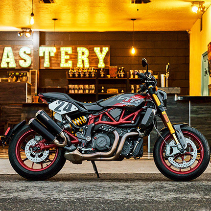 Side profile of an Indian FTR R Carbon standard-style motorcycle.