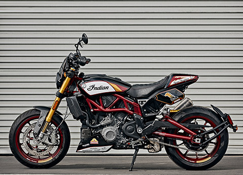 Side profile of an Indian FTR standard-style motorcycle.