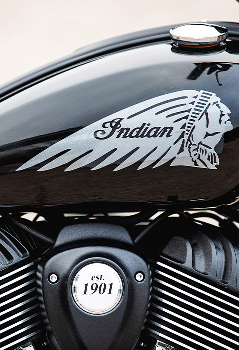 Closeup of the Black Metallic tank on a 2025 Indian Chief Bobber cruiser motorcycle.