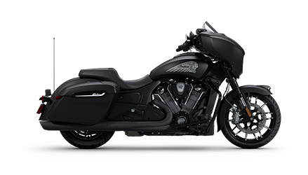 Side profile of a 2025 Indian Chieftain PowerPlus Dark Horse 112 with PowerBand Audio motorcycle in the Black Smoke colorway.