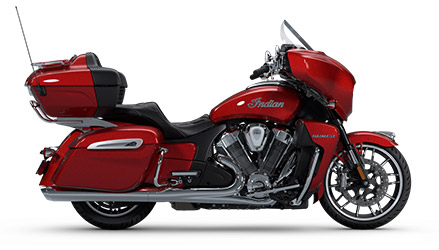 Side profile of a 2025 Indian Roadmaster PowerPlus Dark Horse motorcycle in the Sunset Red Smoke colorway.