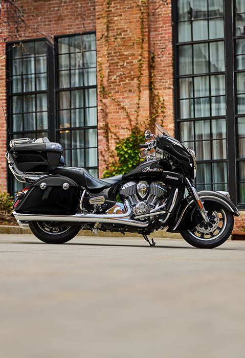 Side profile of a 2025 Indian Roadmaster touring motorcycle in Black Metallic.