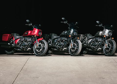 Three 2025 Indian Sport Chief RT cruiser motorcycles in a lineup in various colors.