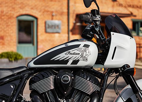 Closeup of the tank and handlebars on a 2025 Indian Sport Chief motorcycle. 