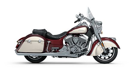 Perfil lateral de una motocicleta bagger 2025 Indian Springfield en Maroon Metallic / Silver Quartz Metallic.