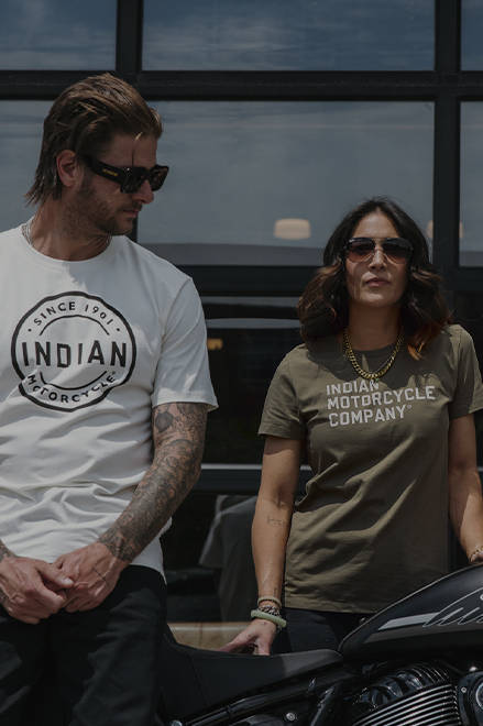 Man and woman wearing Indian Motorcycle t-shirts. 