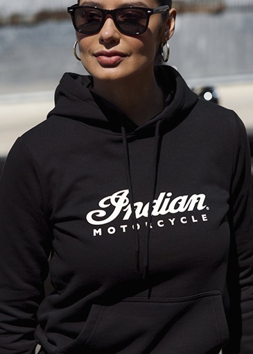 Woman wearing Indian Motorcycle sweatshirt. 