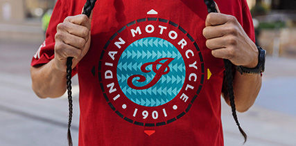 Man wearing Indian Motorcycle x RVSO collection t-shirt. 