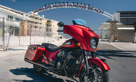 Indian Motorcycle parked in front of Daytona Beach Sign at Biketoberfest. 