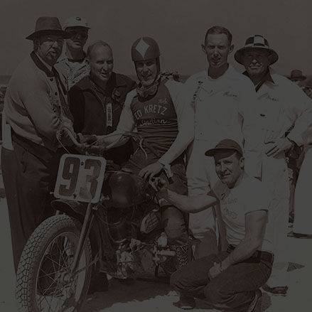 Ed Kretz poses with crew after winning the first Daytona 200 race on an Indian Sport Scout.
