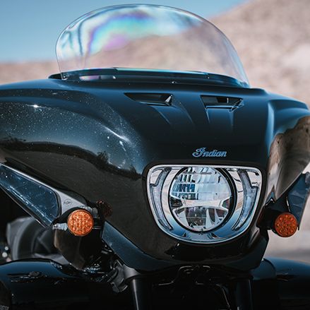 Fork-mounted fairing on an Indian Roadmaster touring motorcycle.