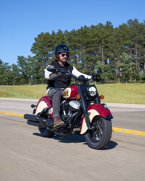 Rider cruising on a Chief Vintage Sturgis, SD Edition Indian Motorcycle.
