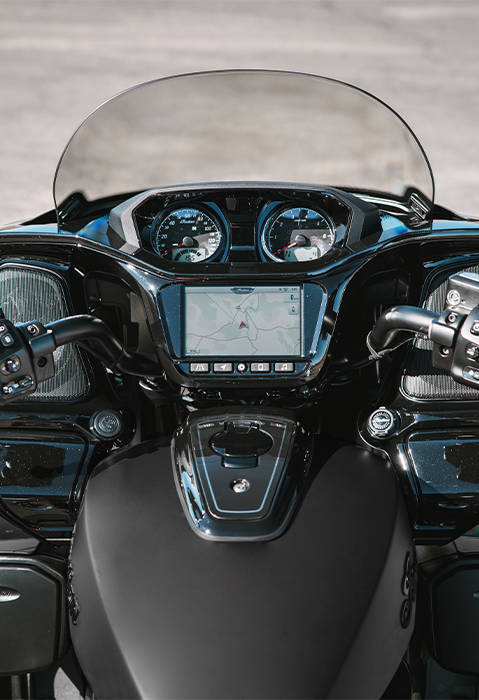 Closeup of the RIDE COMMAND touch screen, tank, handlebars, windshield and gauges on a Indian Pursuit touring motorcycle.