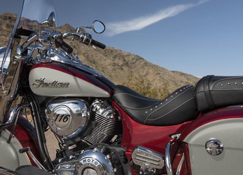 Side profile of a 2026 Indian Springfield bagger motorcycle showcasing the tank, seat, engine, handlebars and colors. 