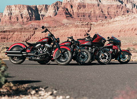 4 Indian 125th Anniversary Edition motorcycles in a lineup.