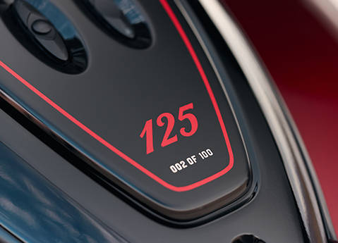 Tank badging and 002 of 100 numbering on a 2026 Indian Roadmaster 125th Anniversary Edition motorcycle.