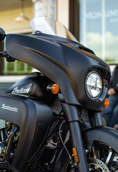 Closeup of the front end of a 2026 Indian Roadmaster Dark Horse touring motorcycle. 